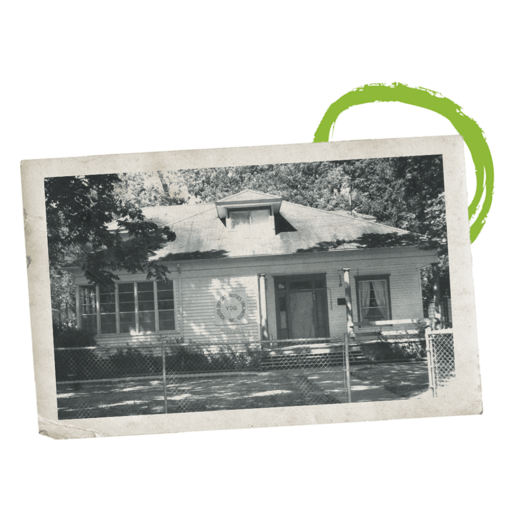 A vintage photo of an old house turned into a youth center