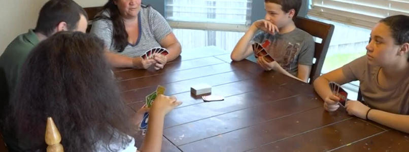 A family playing a card game