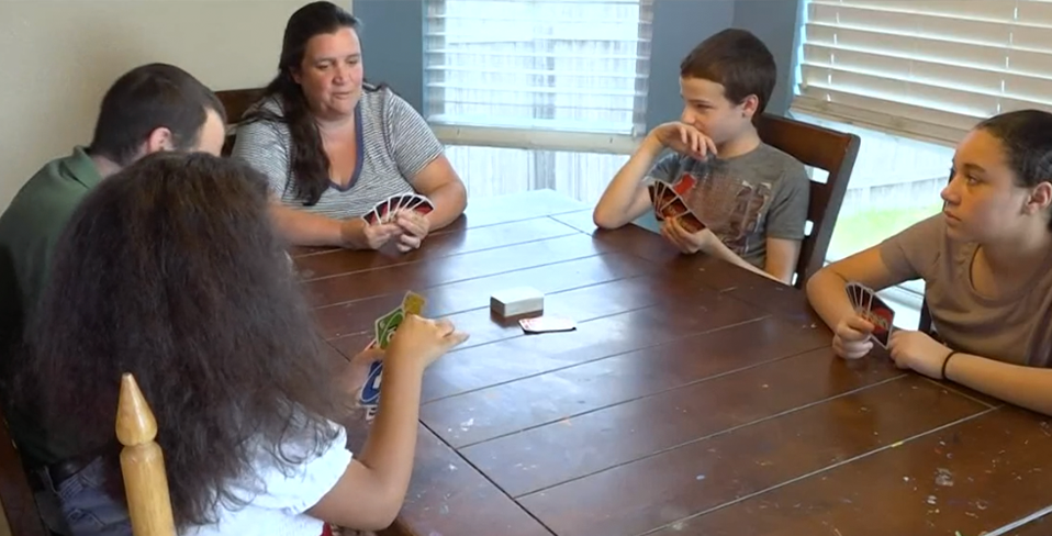 A family playing a card game