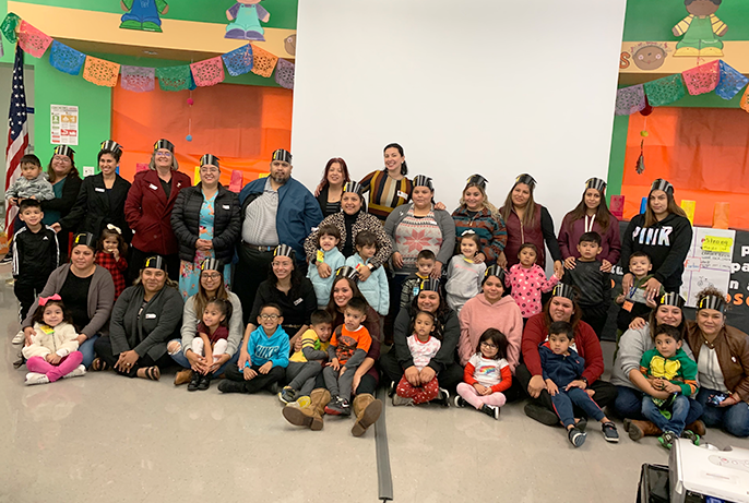 A group of people posing for a large group photo