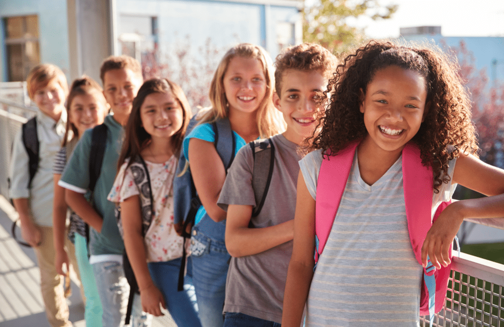 A group of kids standing in line