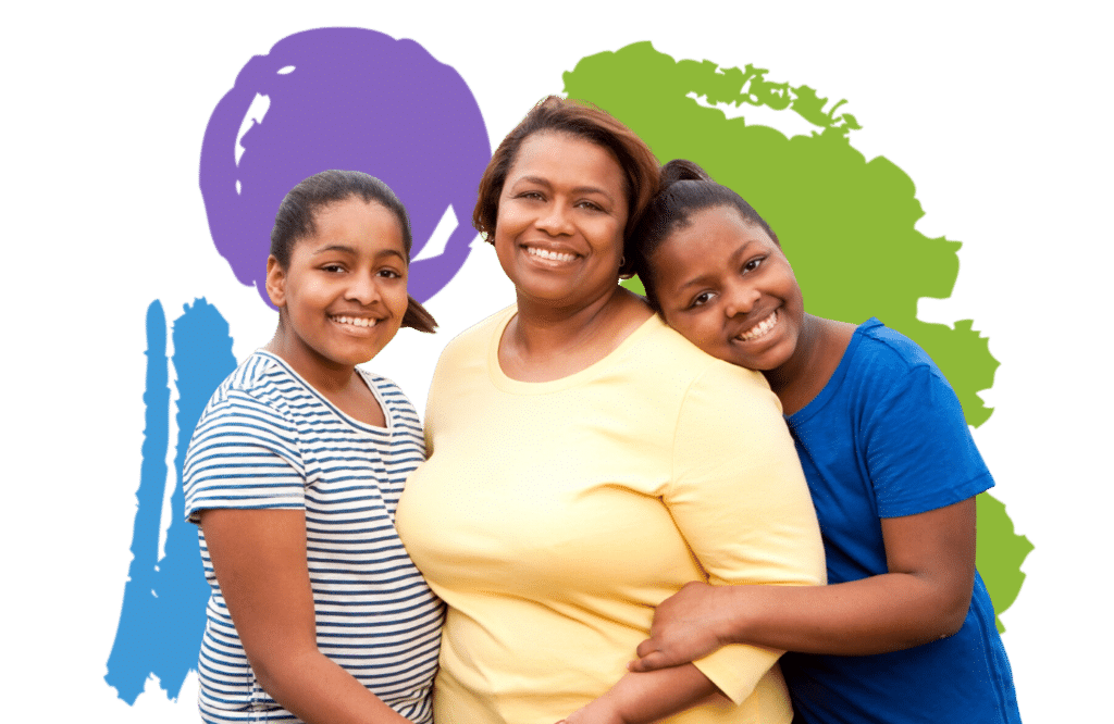 A lading being embraced by two teenage girls