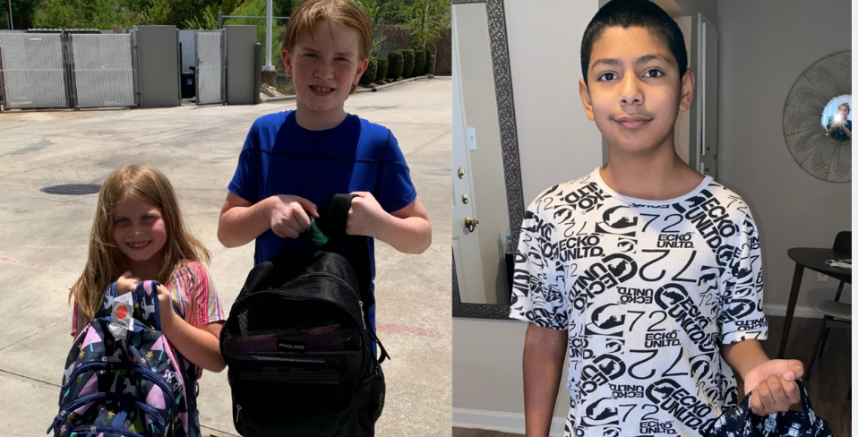 Three kids with new backpacks